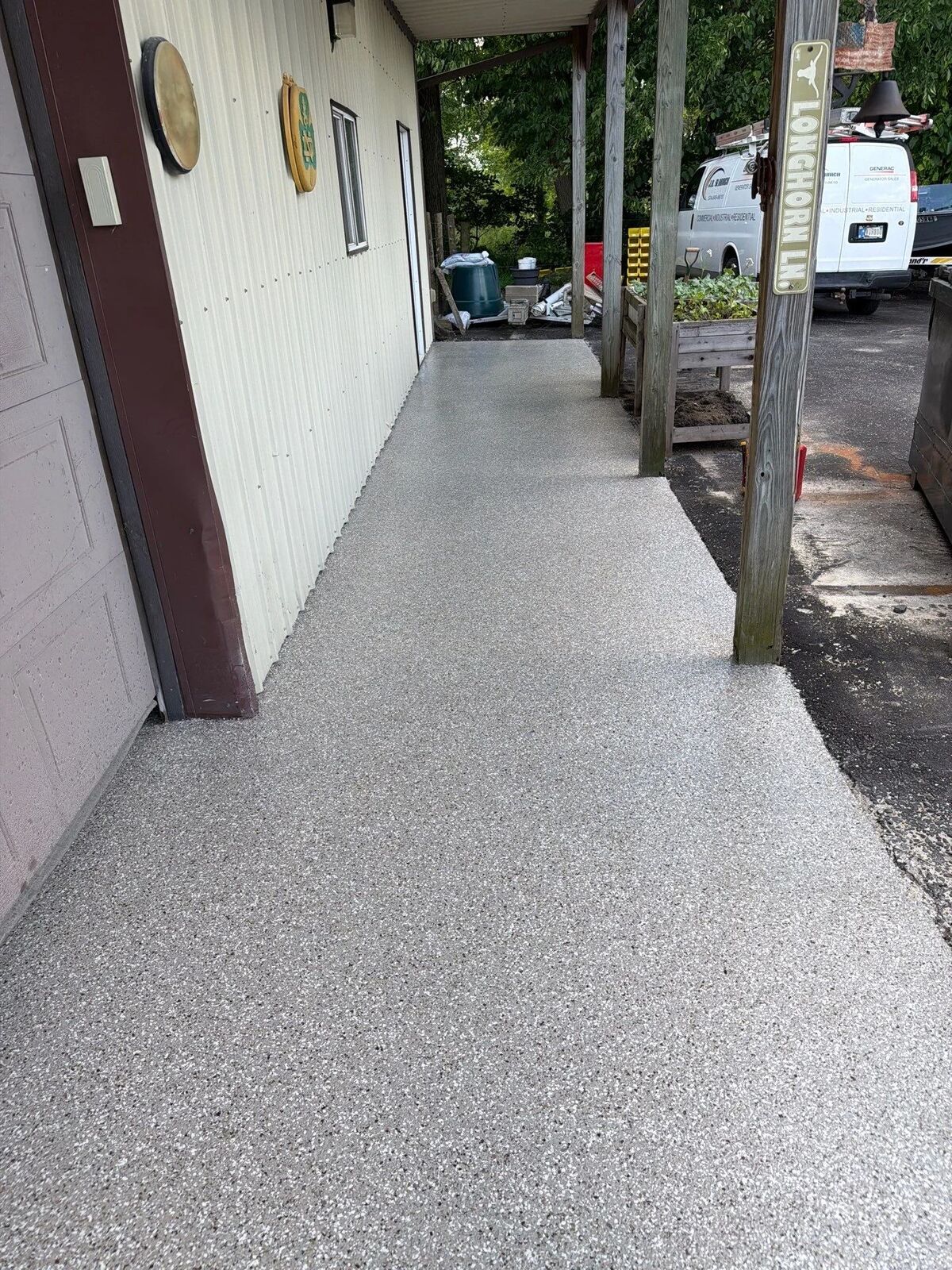 Long finished flake floor running toward a door and window