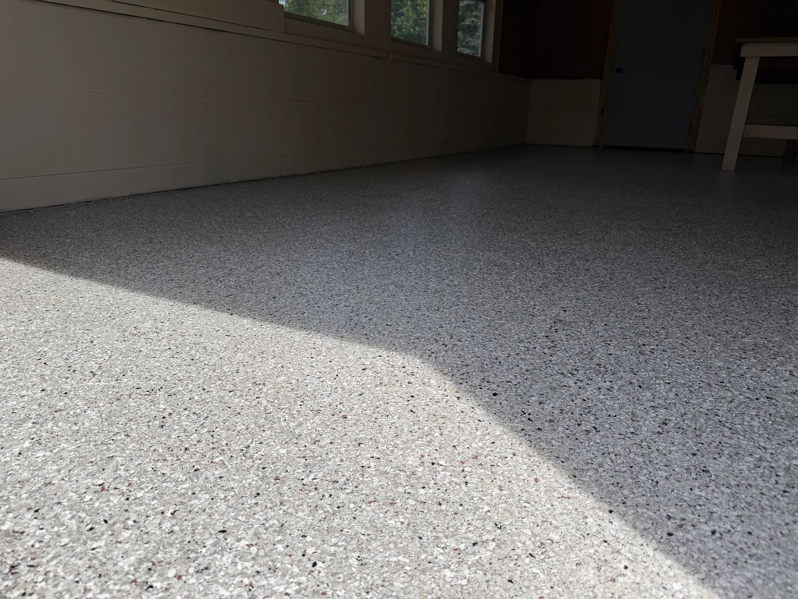 Finished flake floor seen from an open garage door